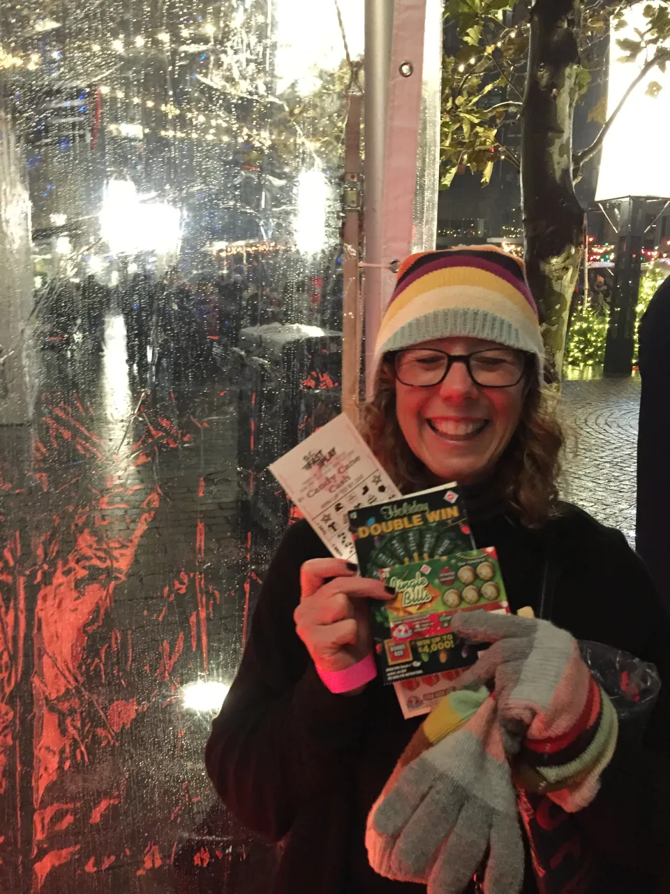 Woman holding scratch tickets