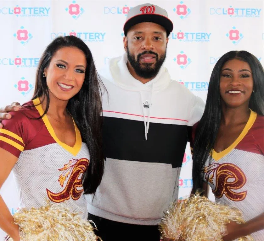 Santana moss and two cheerleaders