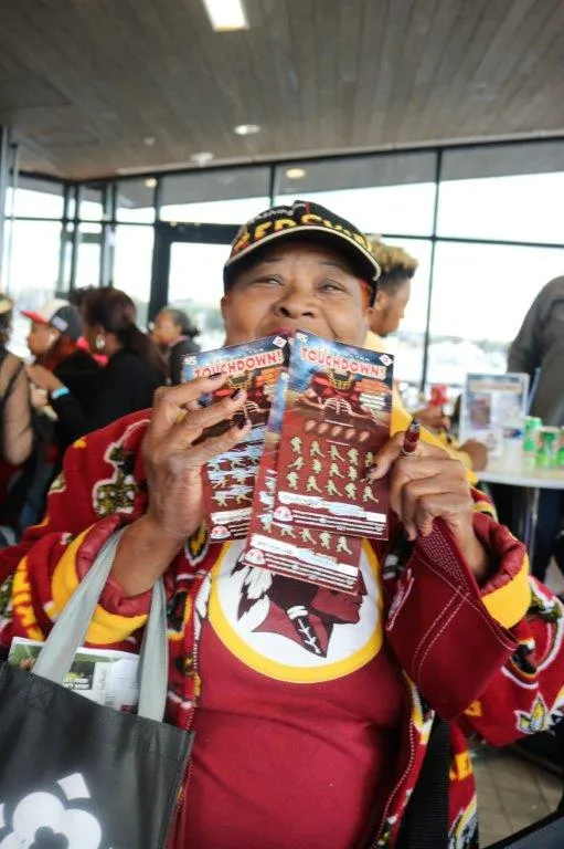 Player holding tickets