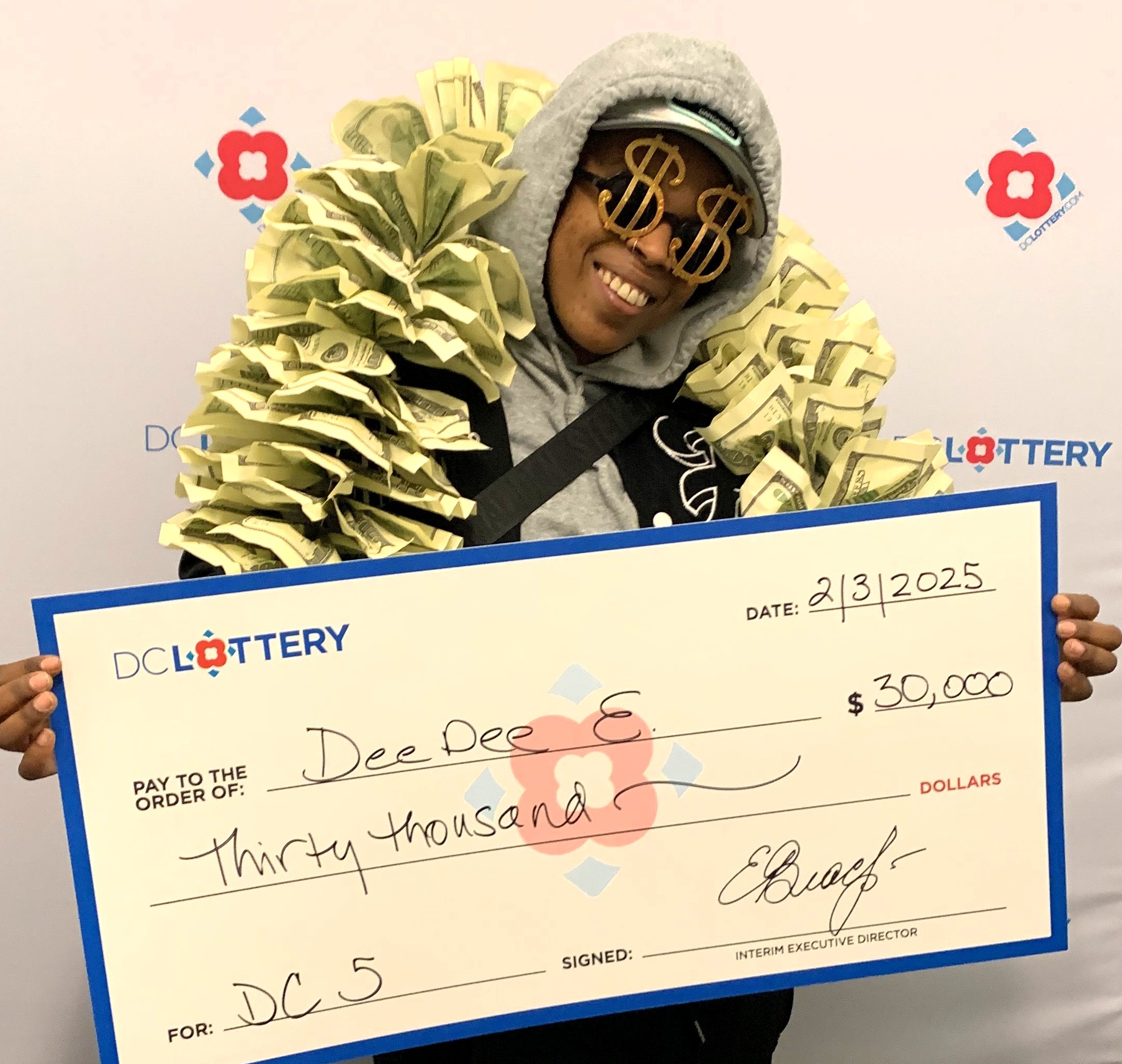 Dee Dee E. claims her DC 5 prize
