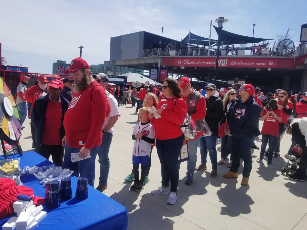 Crowd of people waiting to spin the prize wheel