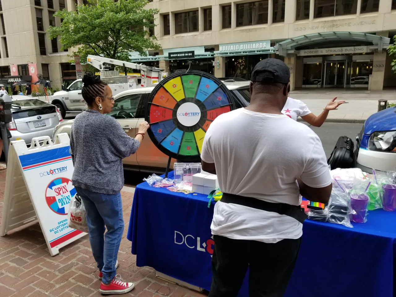 woman spinning prize wheel