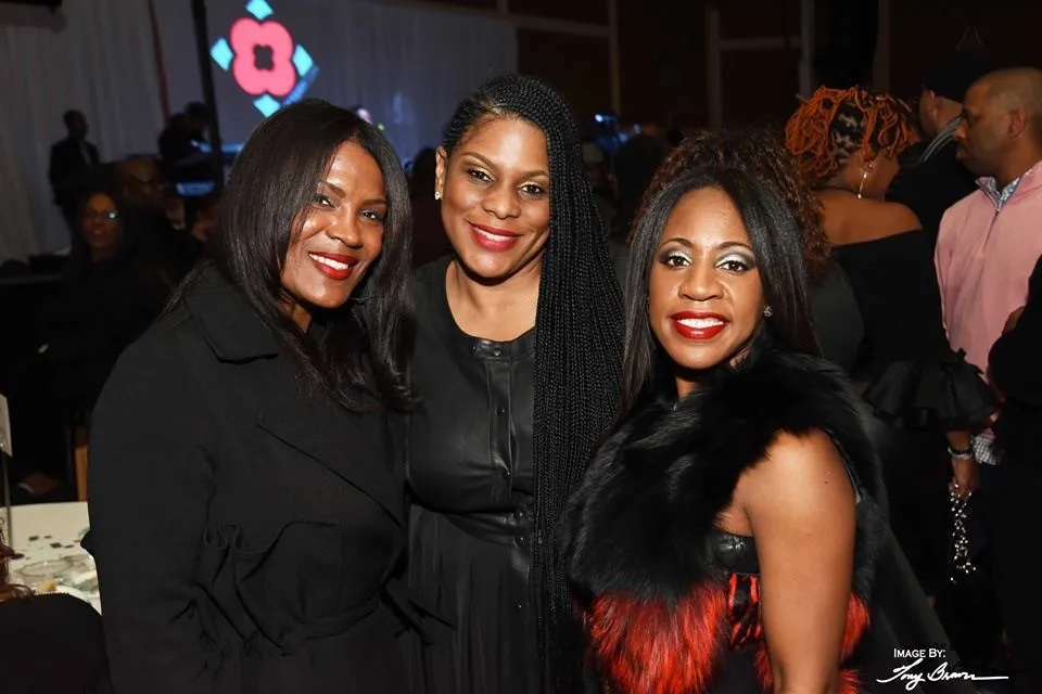 three women posing for a photo