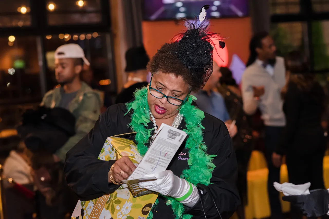Woman scratching tickets